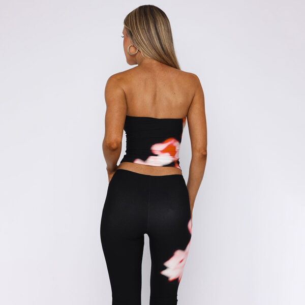 Long black flared trousers detail