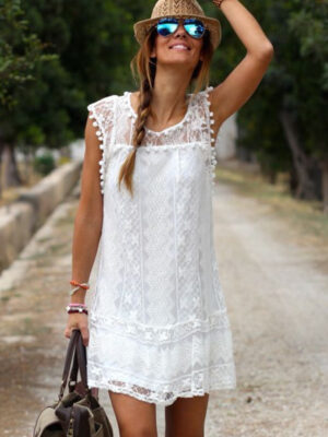 White lace sleeveless dress with wool ball details