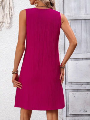 Close-up neckline of sleeveless V-neck vest dress