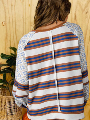 Soft white blouse with striped and floral details